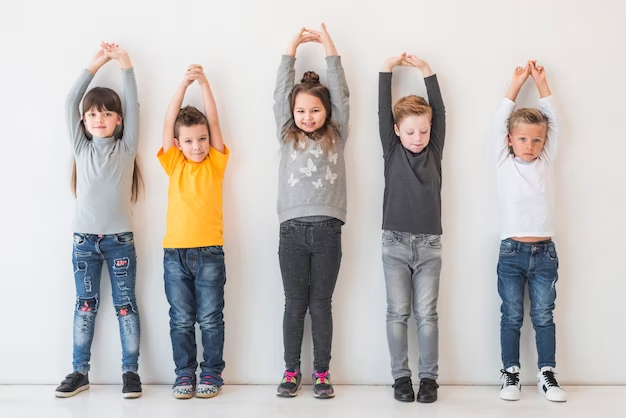 children-with-hands-up-inclusions-uae